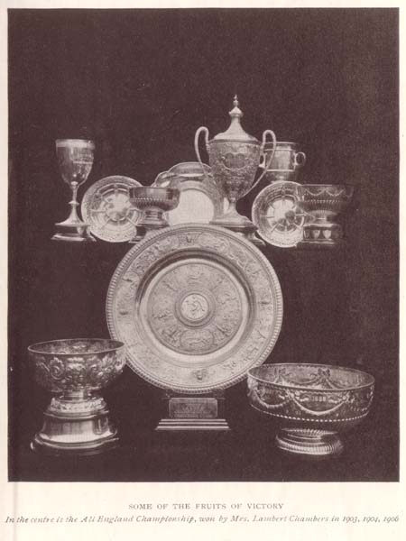 SOME OF THE FRUITS OF VICTORY. <i>In the centre is the All England Championship, won by Mrs. Lambert Chambers in 1903, 1904, 1906</i>